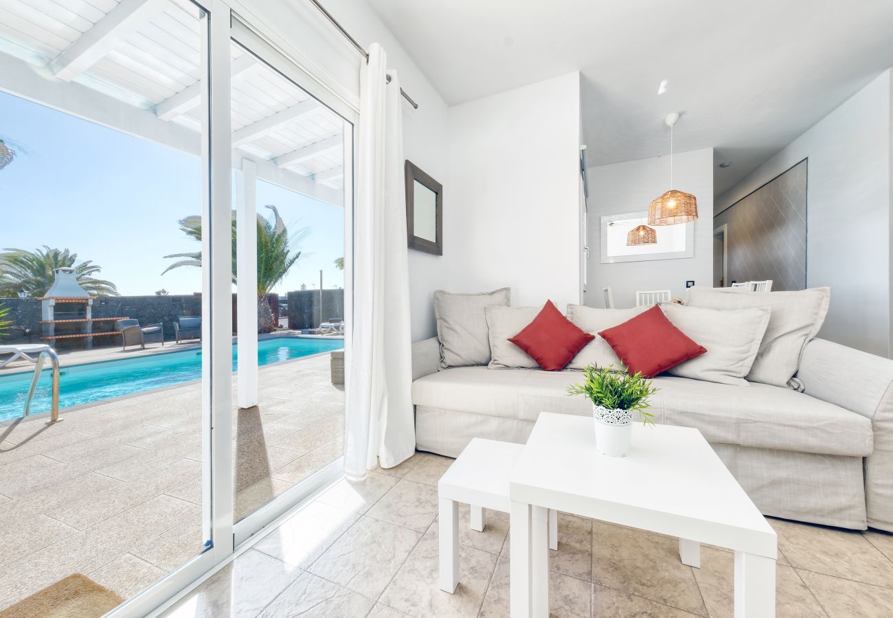 Villa in Playa Blanca - Blue Waves House - Heated Pool, BBQ and Bicycles By LVH