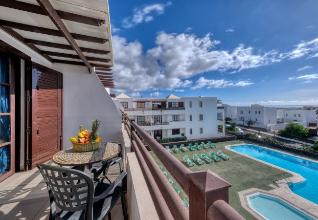 Ferienwohnung in Costa Teguise - Apartment Paradise – Meerblick, Gemeinschaftspool und Tennisplatz