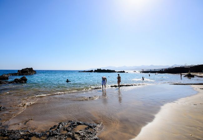 House in Puerto del Carmen - Blue Volcano - 200 from the beach-access to Fariones' sport center ( heated pool, sauna and gym) House in Puerto del Carmen - Blue Volcano - 200 from the beach-access to Fariones' sport center ( heated pool, sauna and gym)