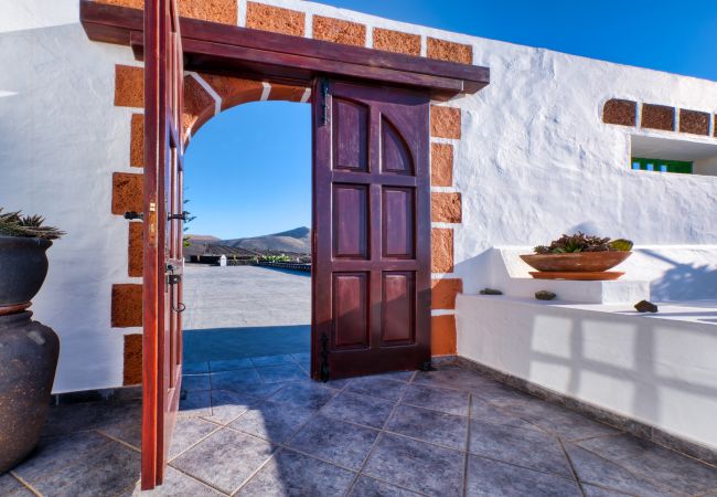 House in Yaiza - Casa Diama 2: view of La Geria and shared pool  House in Yaiza - Casa Diama 2: view of La Geria and shared pool