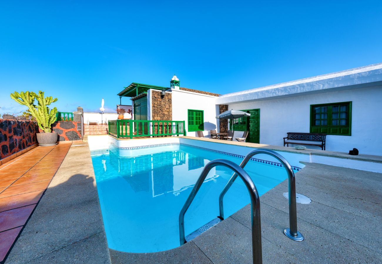 House in Yaiza - Casa Diama 2: view of La Geria and shared pool  House in Yaiza - Casa Diama 2: view of La Geria and shared pool